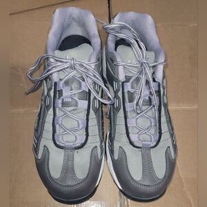 Nautilus steel toe shoes. size 8.  Gray and dark grey with purple accents.